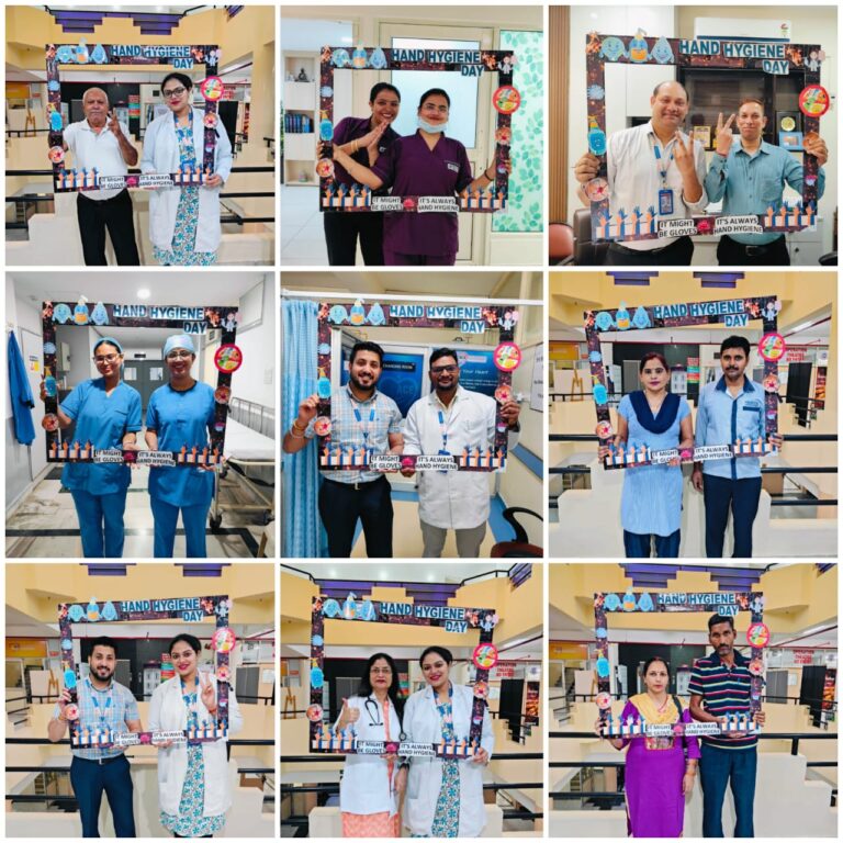 Medical professionals at ACE Heart Institute displaying hand hygiene posters.